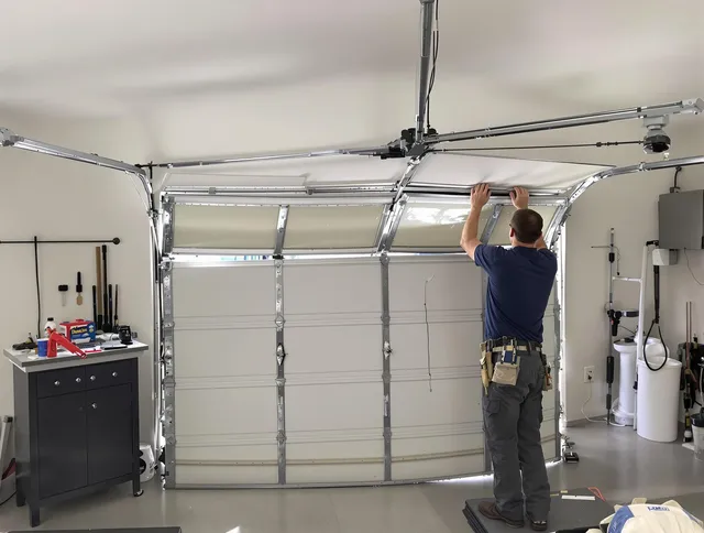 Cimarron Hills Garage Door Repair specialist performing precise section replacement on Cimarron Hills garage door