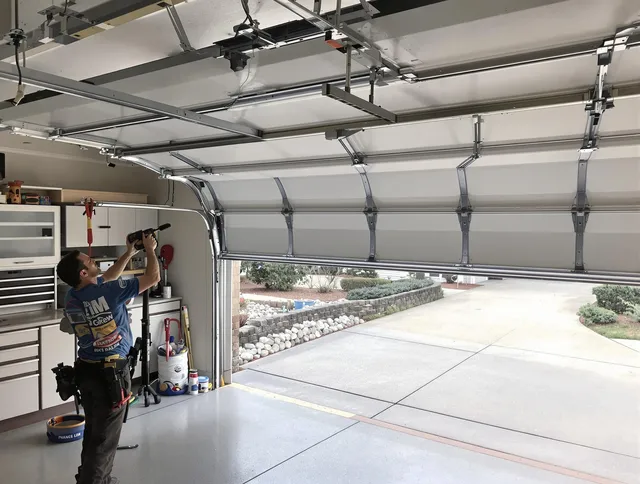Garage door track repair service by Cimarron Hills Garage Door Repair in Cimarron Hills